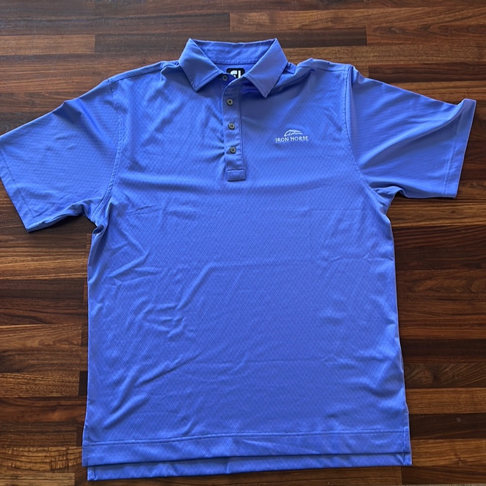 FJ polo; lightly worn; states medium but fits like large